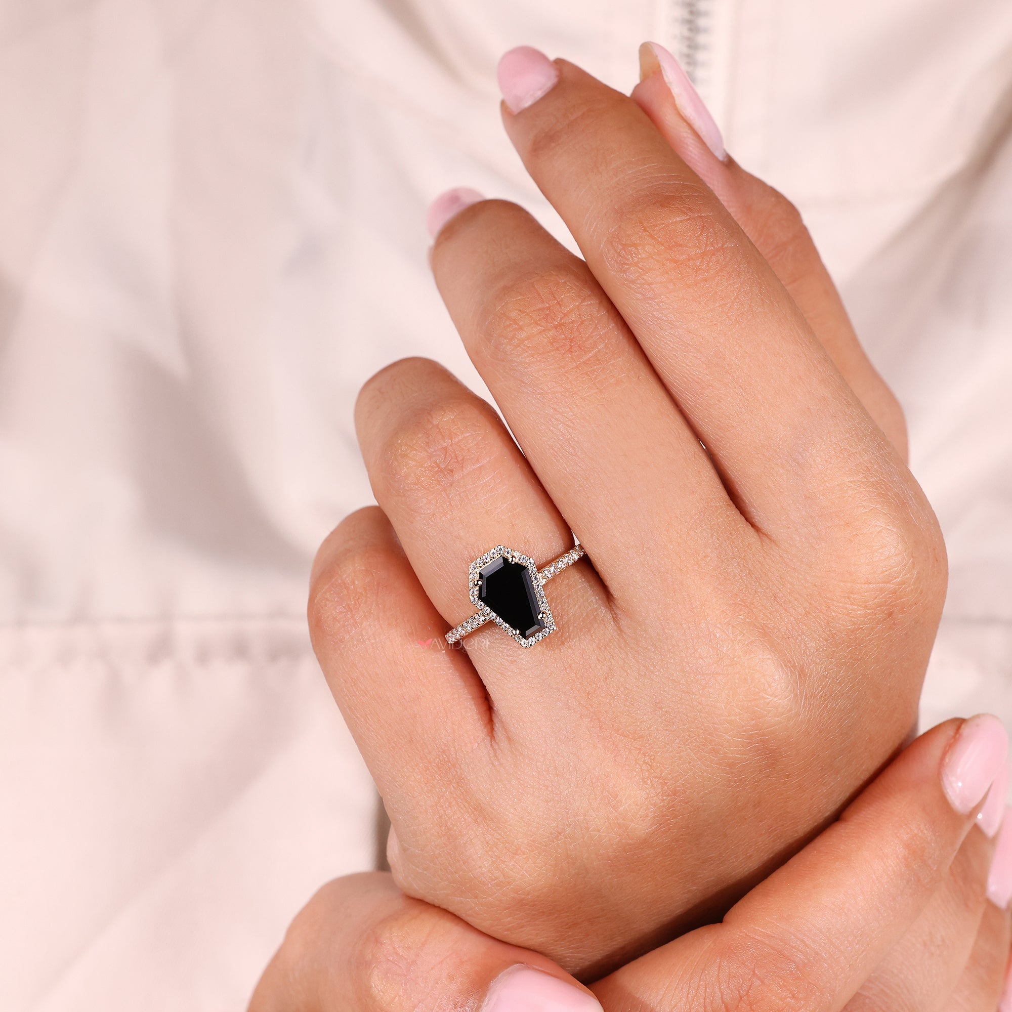 4 prong setting on custom engagement ring.