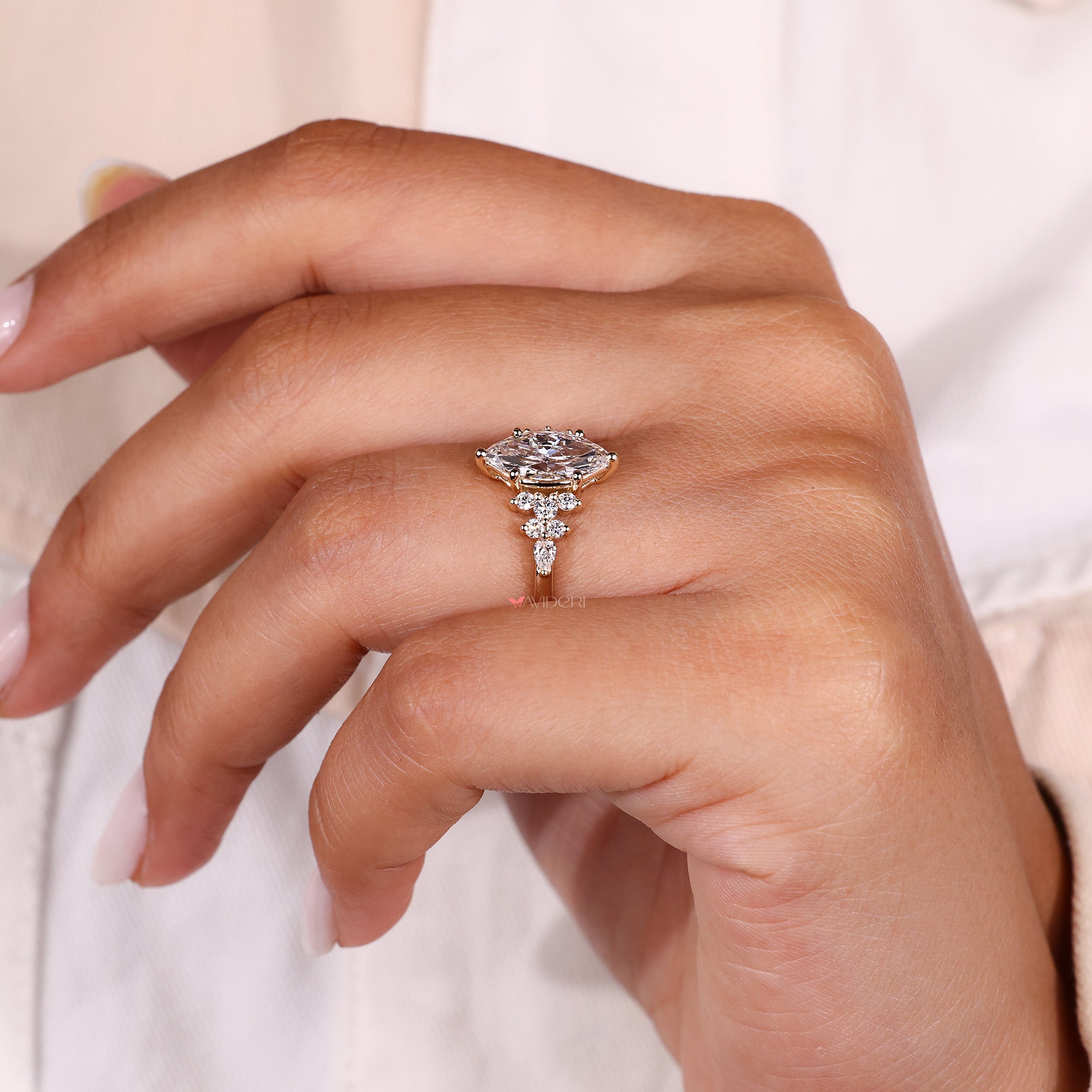 Muse ring Pear Cut side Diamond.