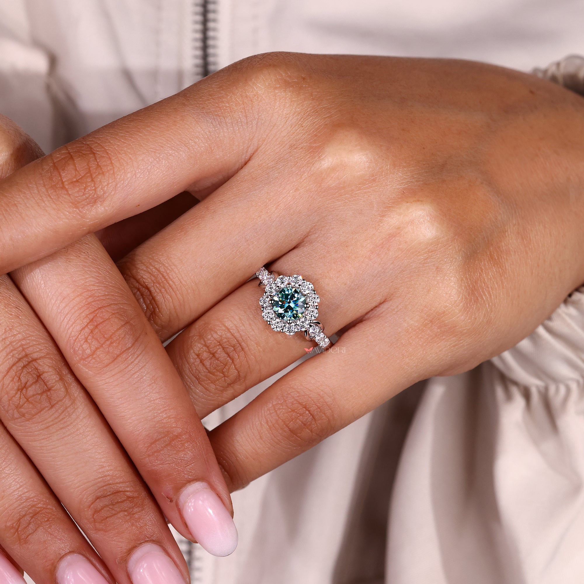 Halo ring featuring a dazzling moissanite center.