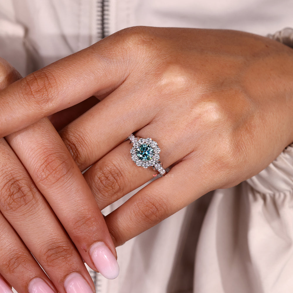 Halo ring featuring a dazzling moissanite center.