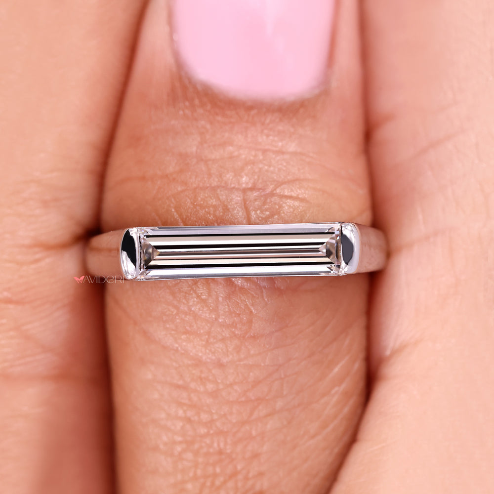 IGI certified diamond ring with baguette cut.