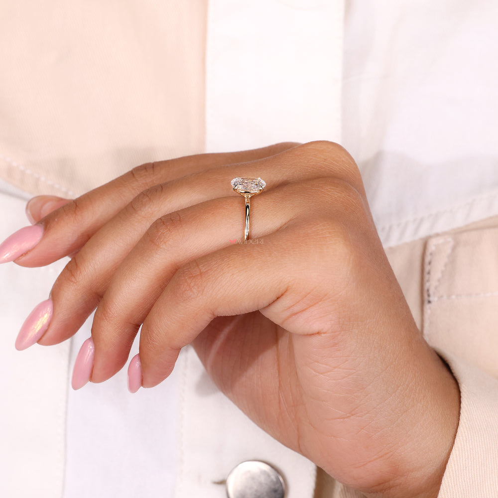 Oval shaped diamond ring, solitaire engagement ring, 4 claw prong
