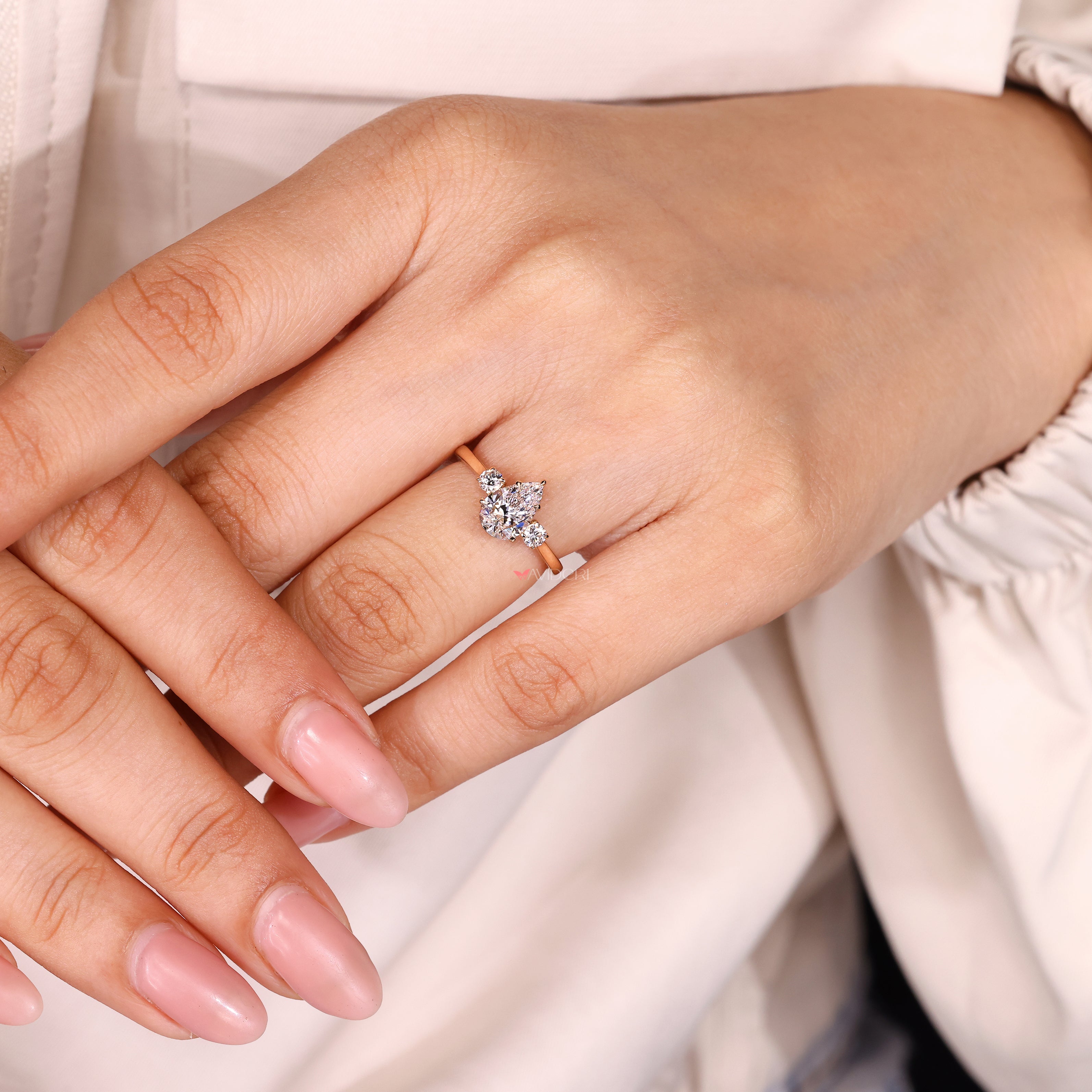 Pear cut lab diamond ring with cathedral style band
