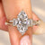 Marquise diamond ring with baguette side stones.
