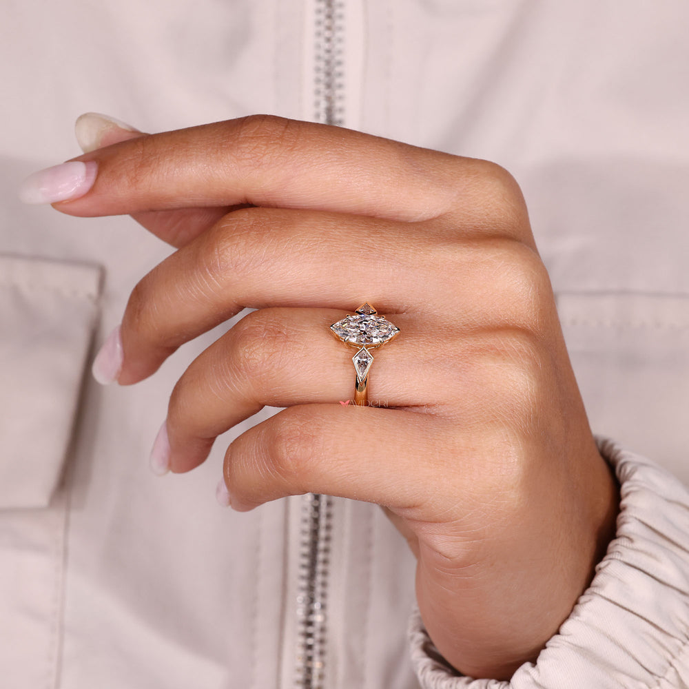 Marquise Diamond Ring with bezel sides.
