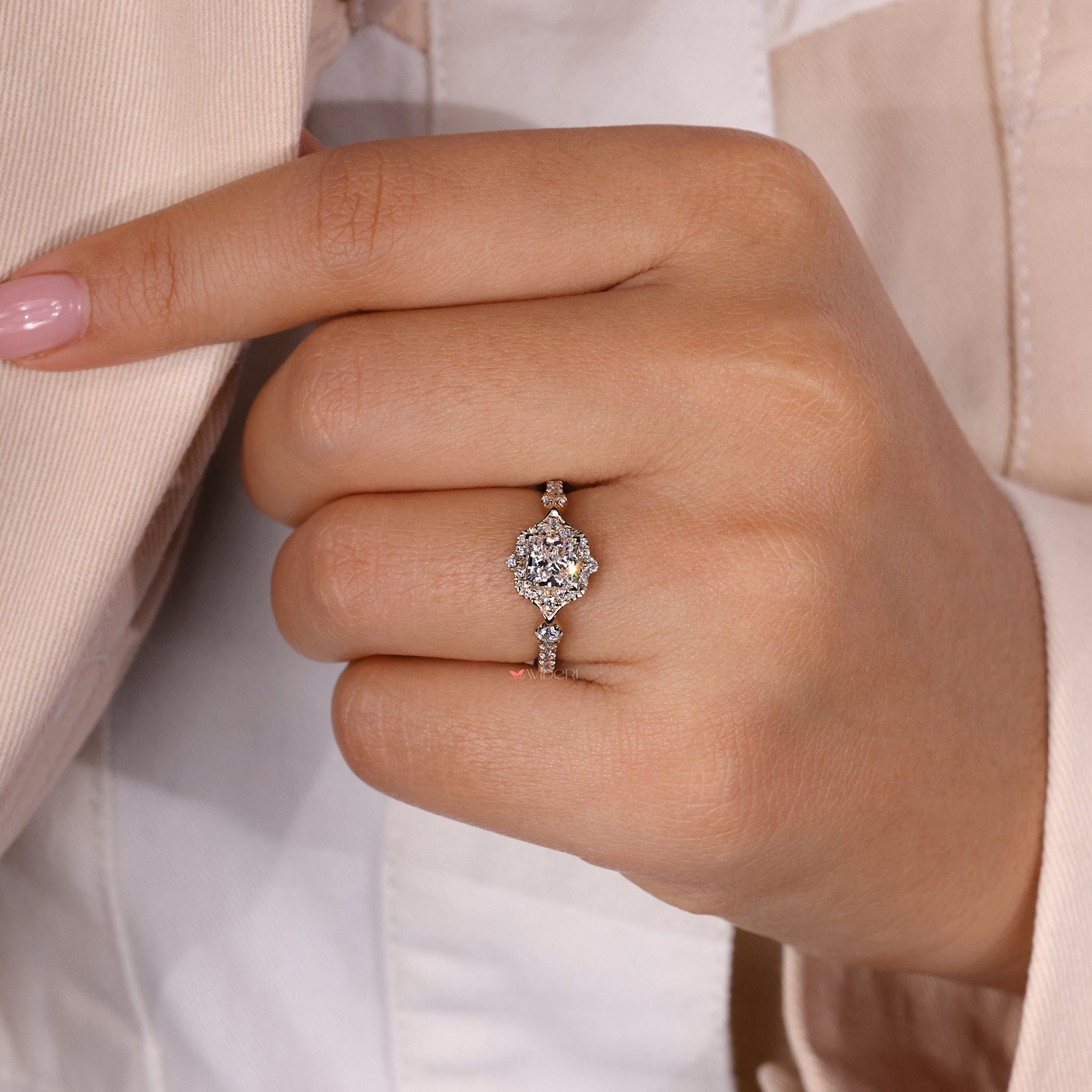 Custom diamond ring with princess cut and halo.