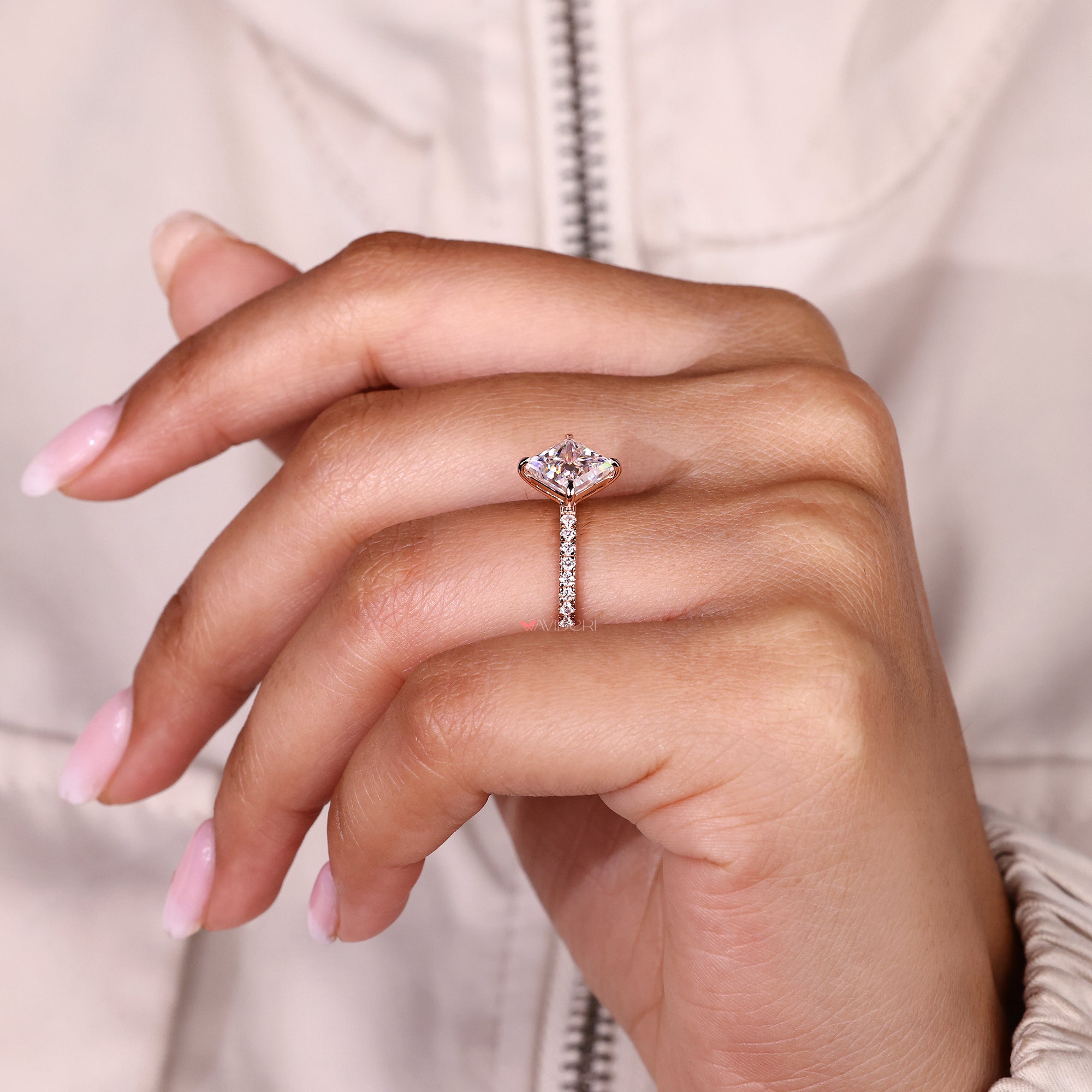 Elegant pave band ring with square moissanite centre in rose gold.