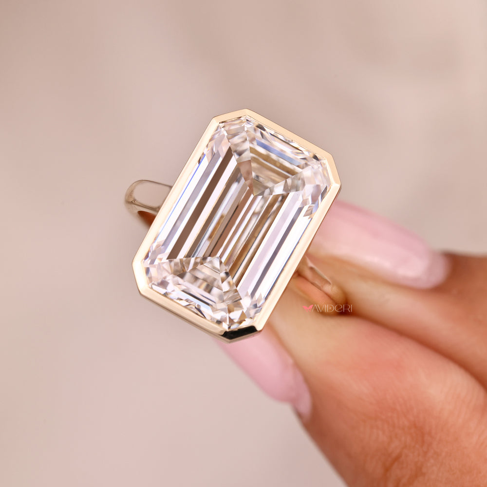Avideri Emerald Cut Diamond Ring with Bezel Setting.