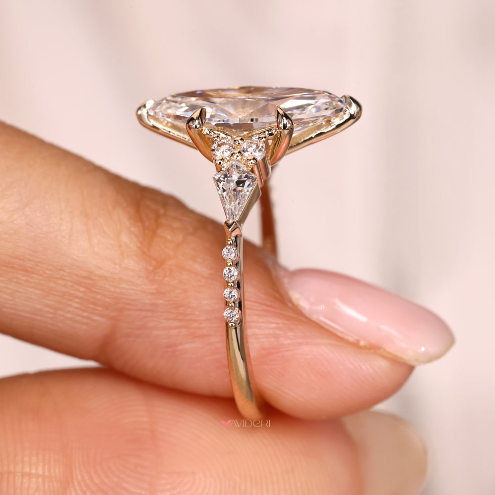 IGI certified marquise diamond ring with six claw prongs.
