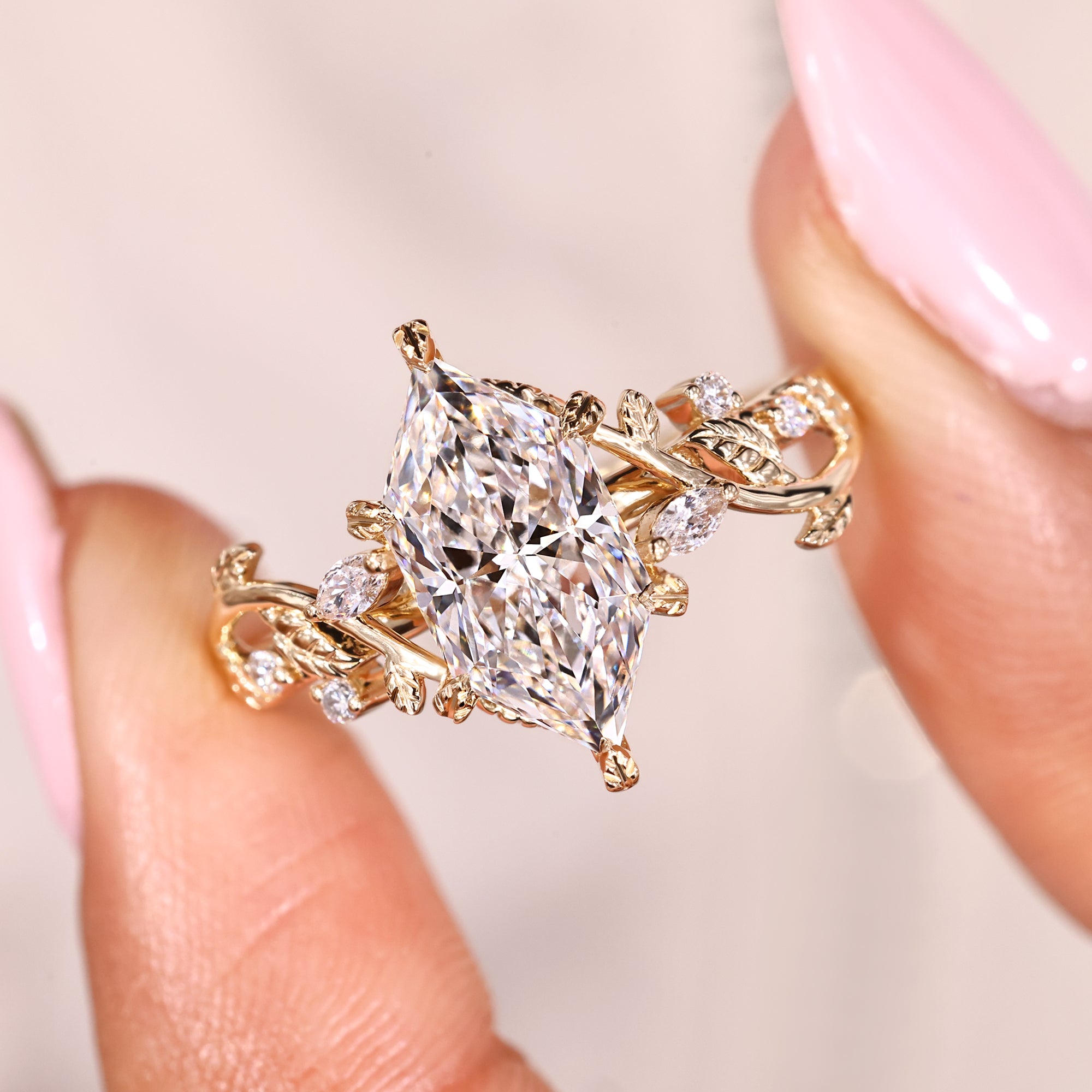 Nature inspired engagement ring in leaf style prong setting.