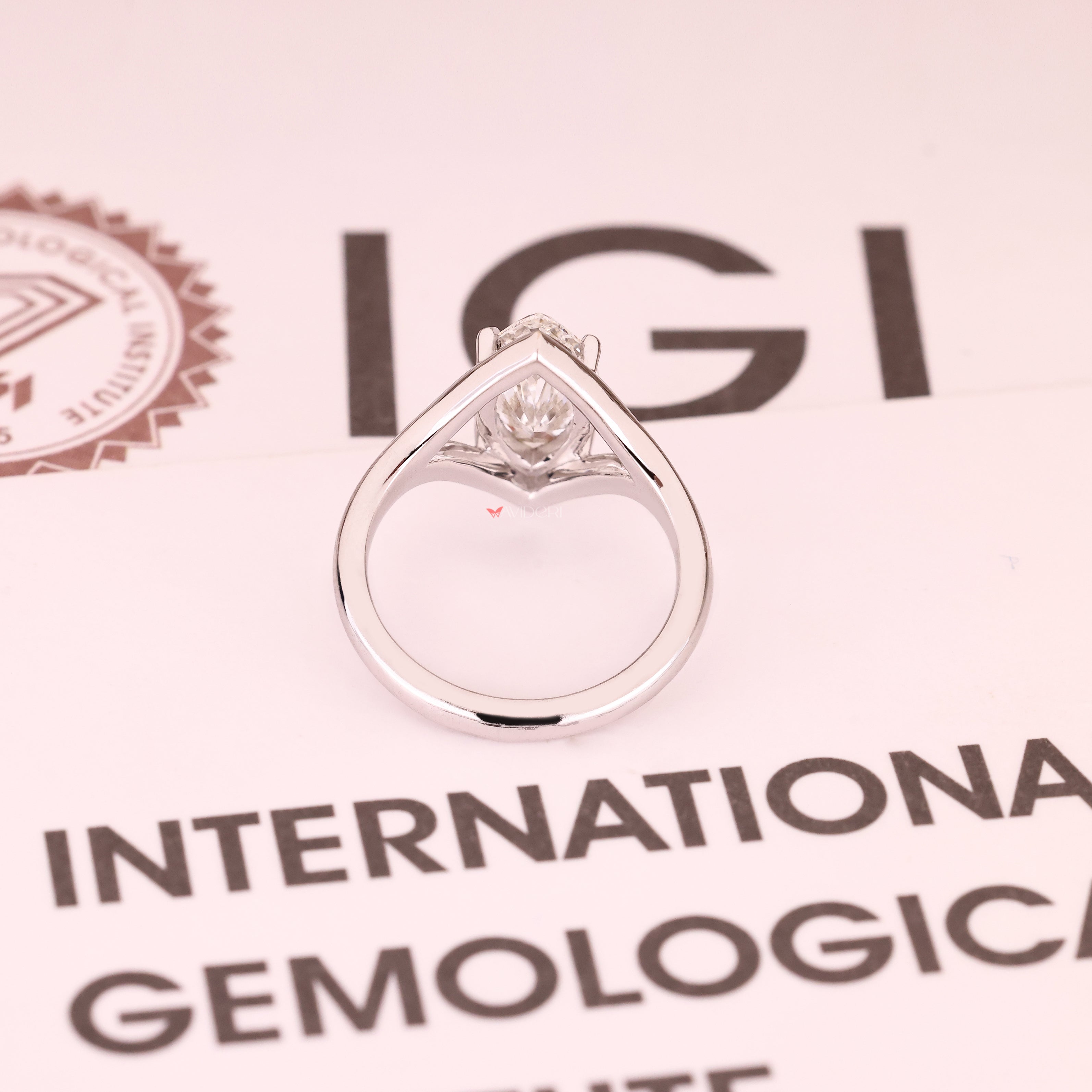 Marquise cut diamond ring with four claw prong setting
