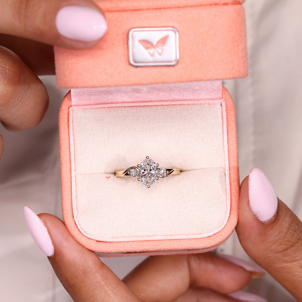 Oval cut diamond ring with classic six prong setting
