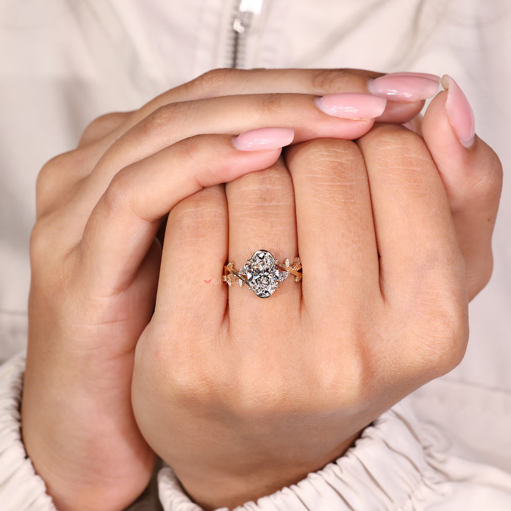Lab grown diamond ring with four leaf style prongs
