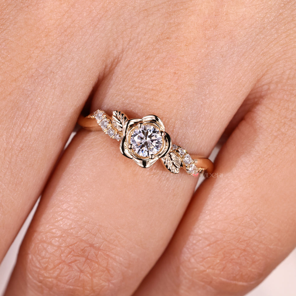 floral diamond ring with pave accents and warm yellow gold finish.