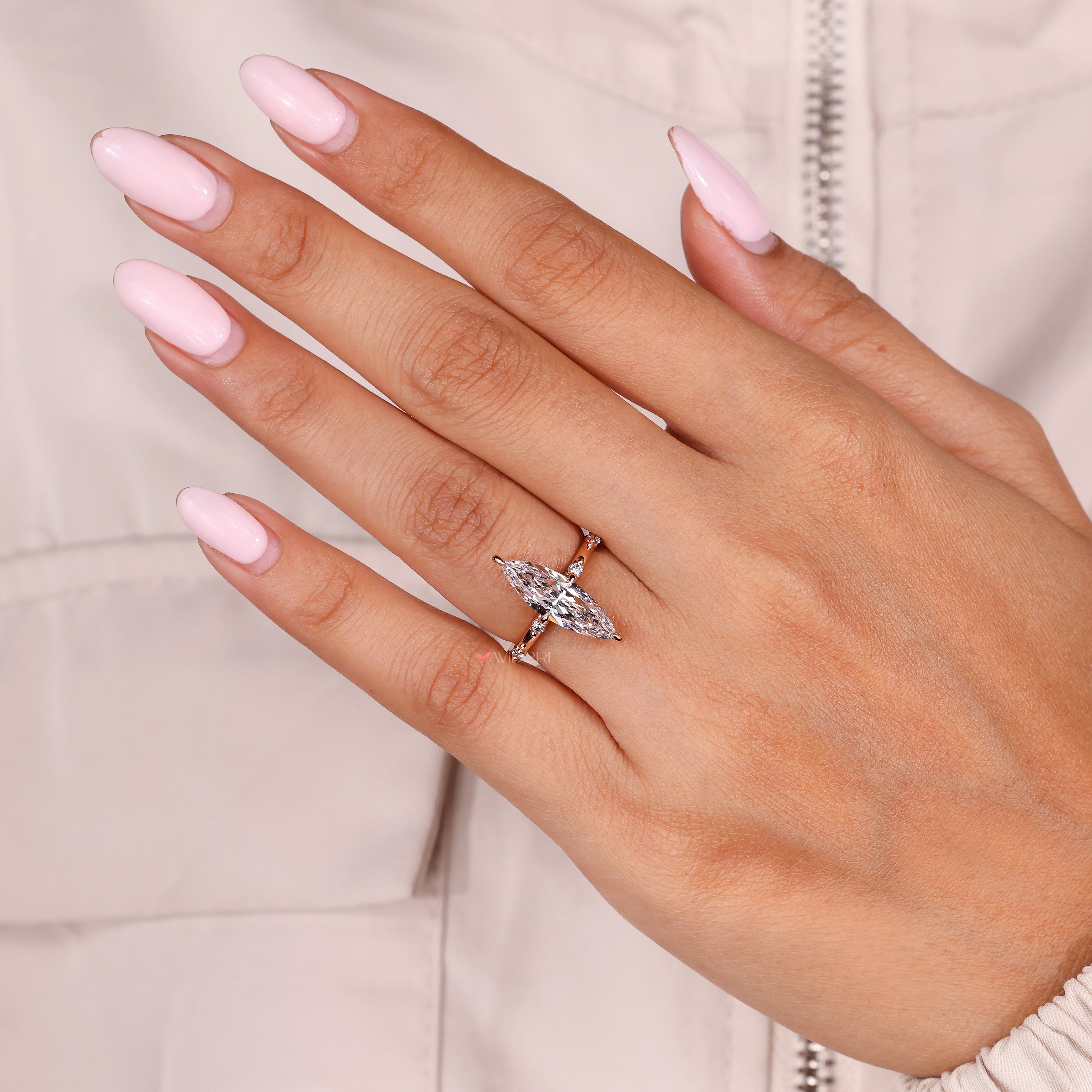 IGI certified marquise diamond ring with compass claw prongs
