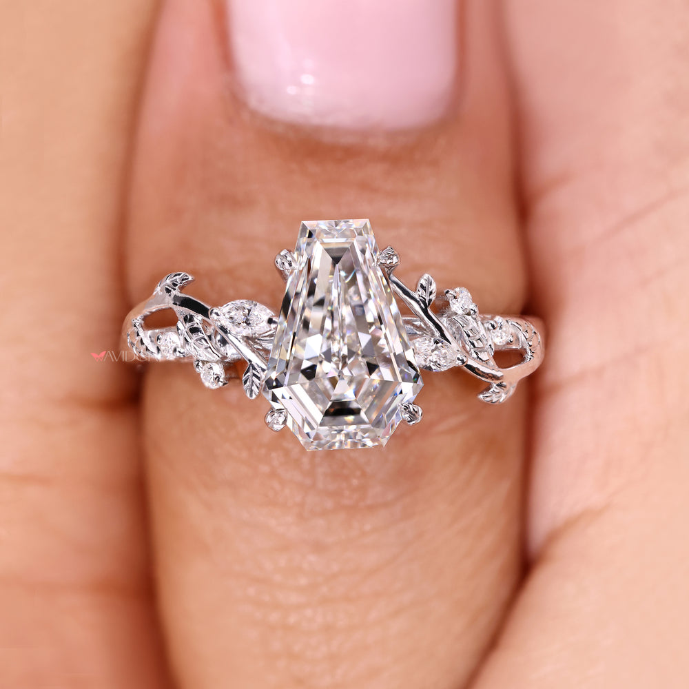 Leaf style prong setting with handmade ring.