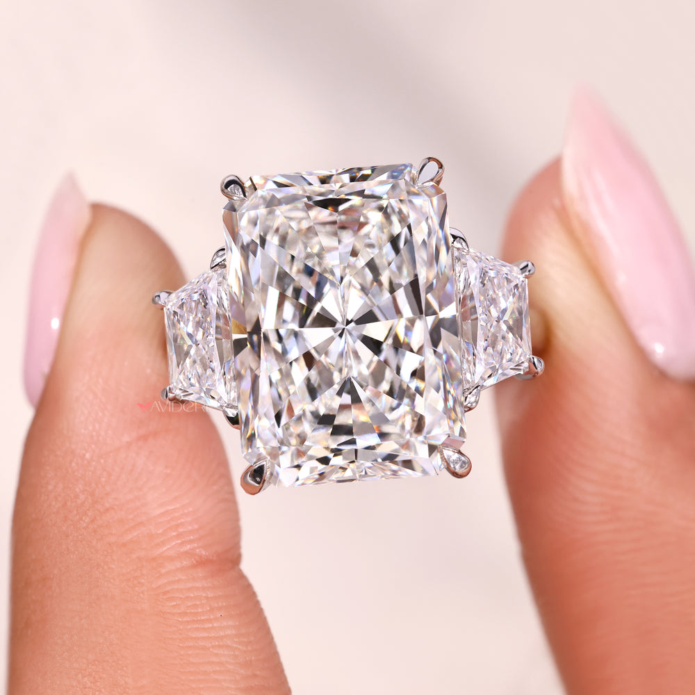 Handmade jewelry with radiant cut engagement ring.