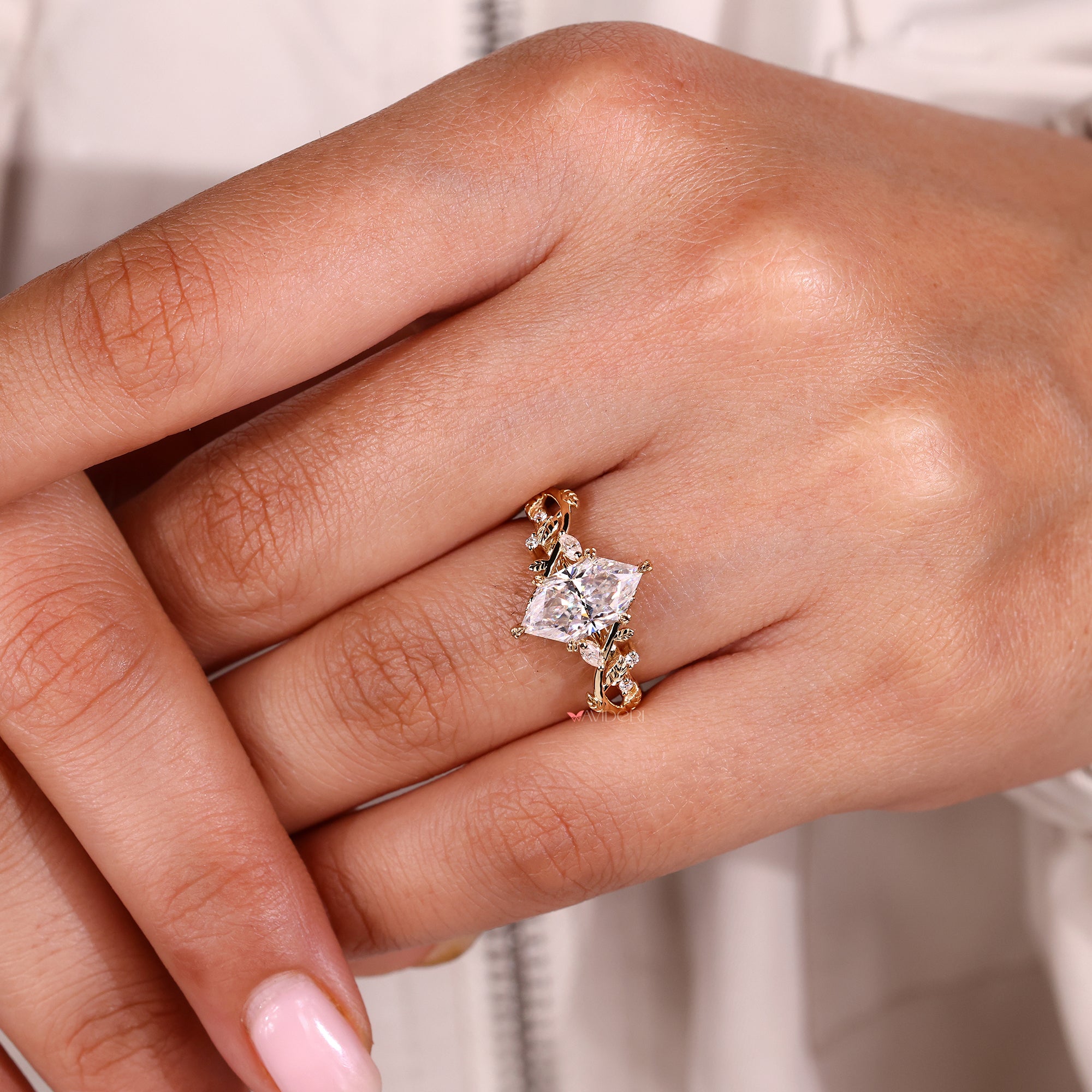 Buy a moissanite ring in a nature inspired style.