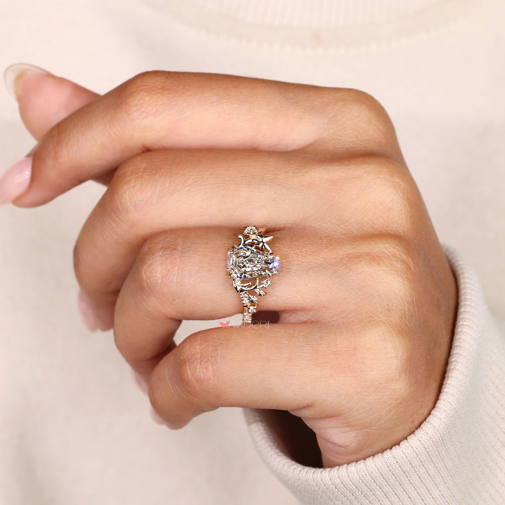 Pave coffin diamond ring with nature inspired detail.
