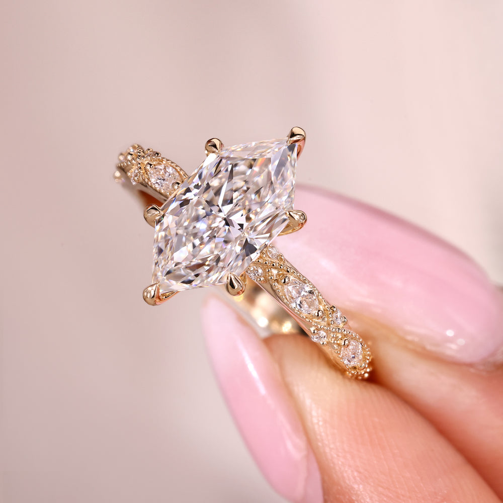 Handmade dutch marquise diamond ring with milgrain detail.