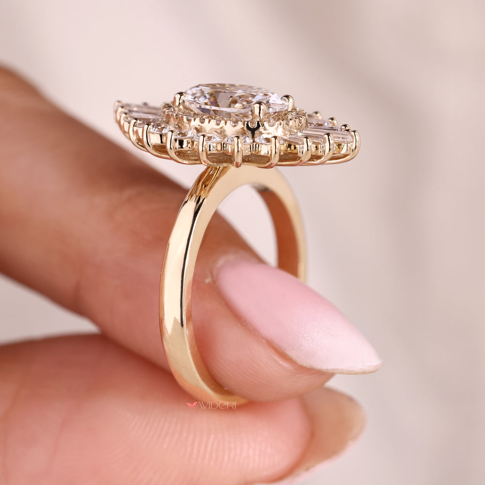 Oval engagement ring with round side stones and halo.