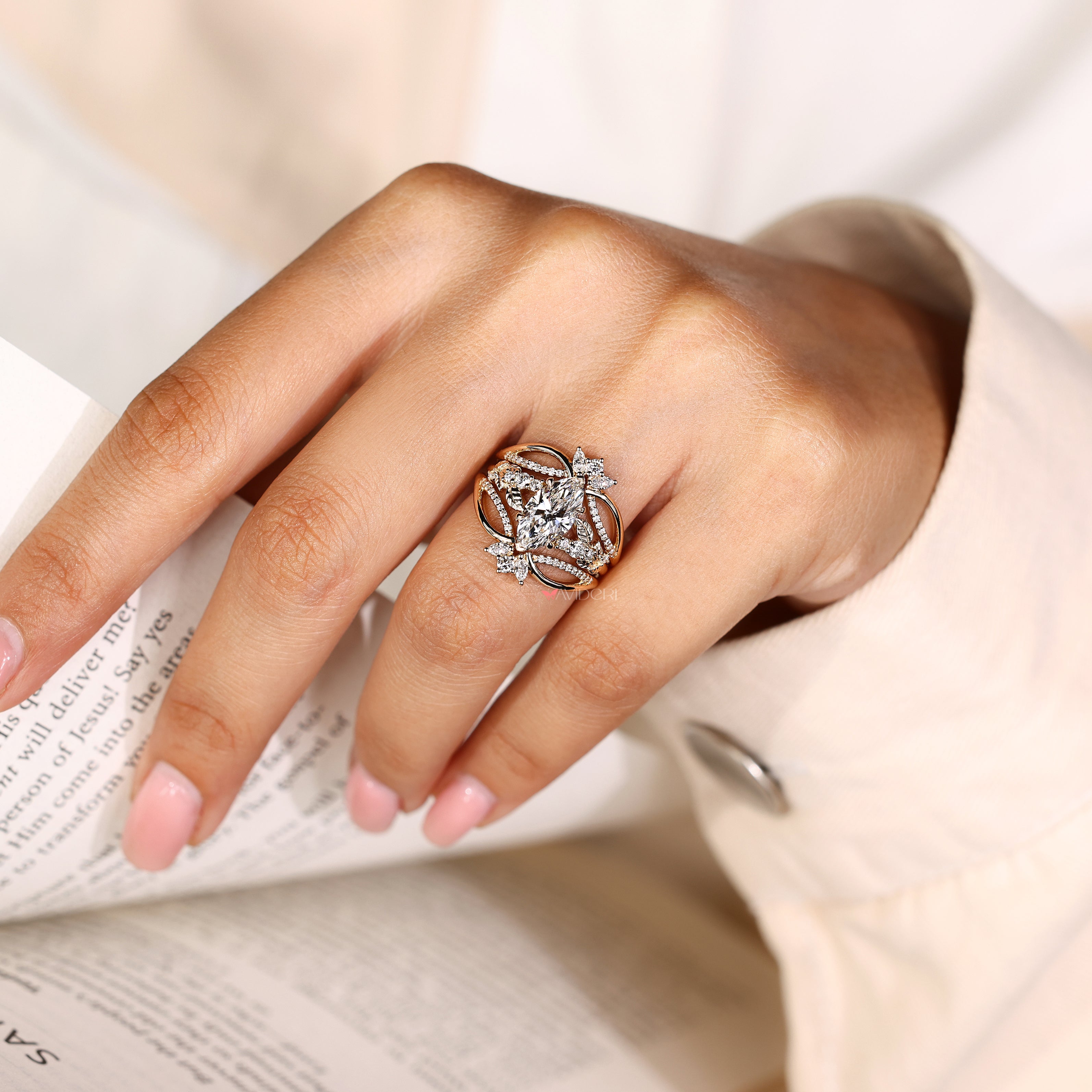 Lab grown marquise diamond ring with round side stones
