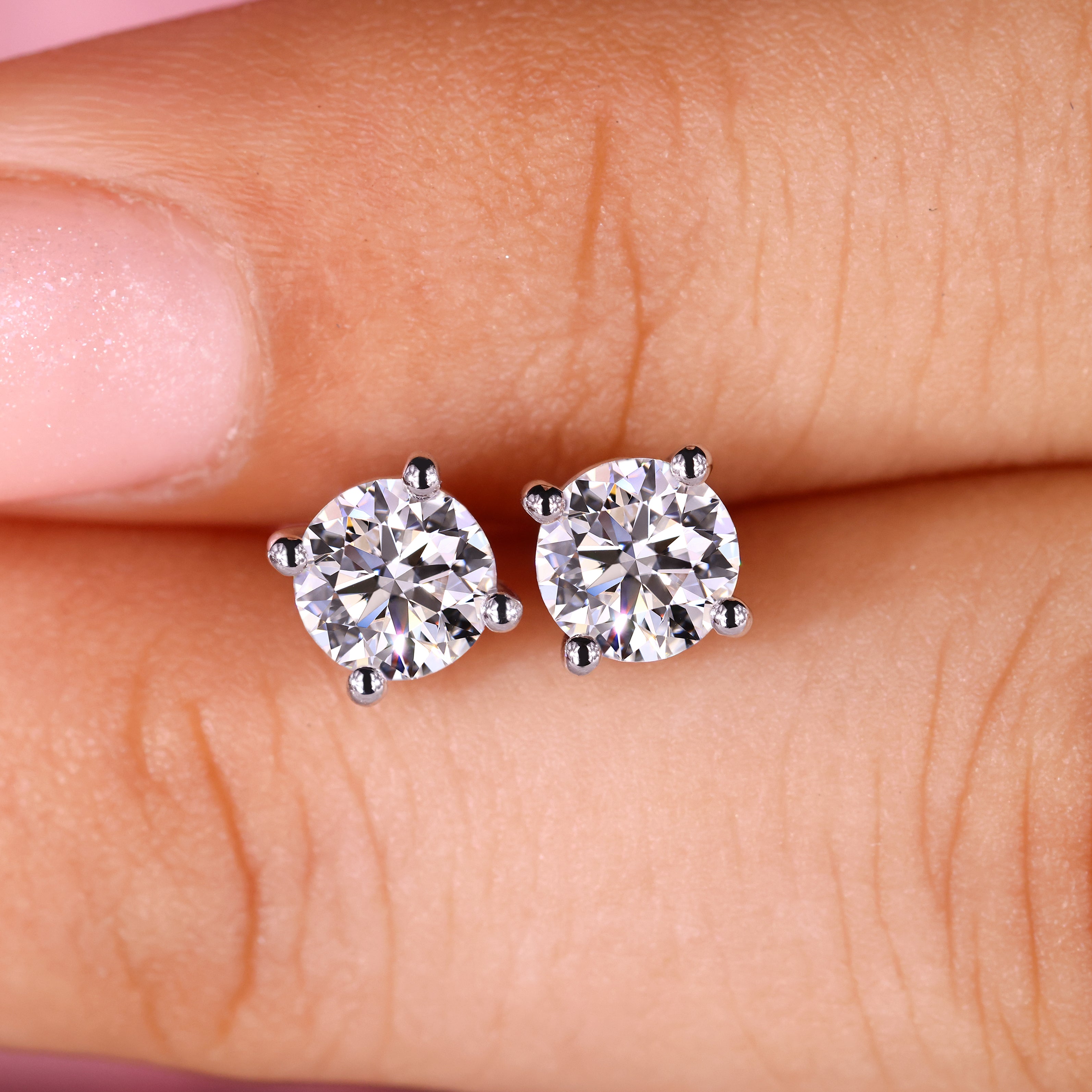 Elegant round cut earrings add a timeless charm to your everyday or special occasion look with ease.
