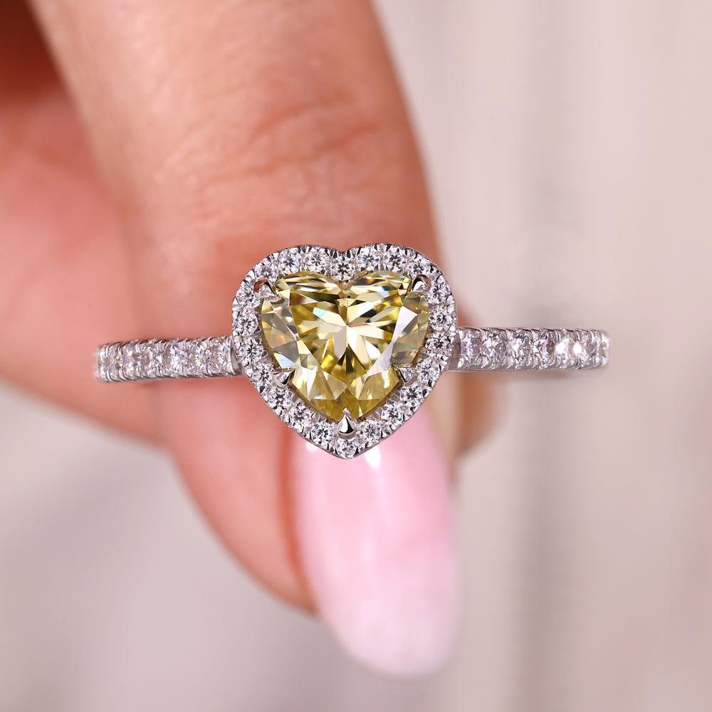 Heart cut canary yellow moissanite ring with pave.