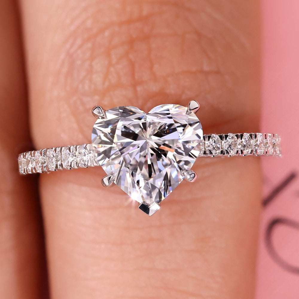 Heart shaped engagement ring with v prong setting.