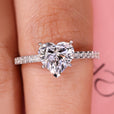 Heart shaped engagement ring with v prong setting.