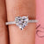 Heart shaped engagement ring with v prong setting.