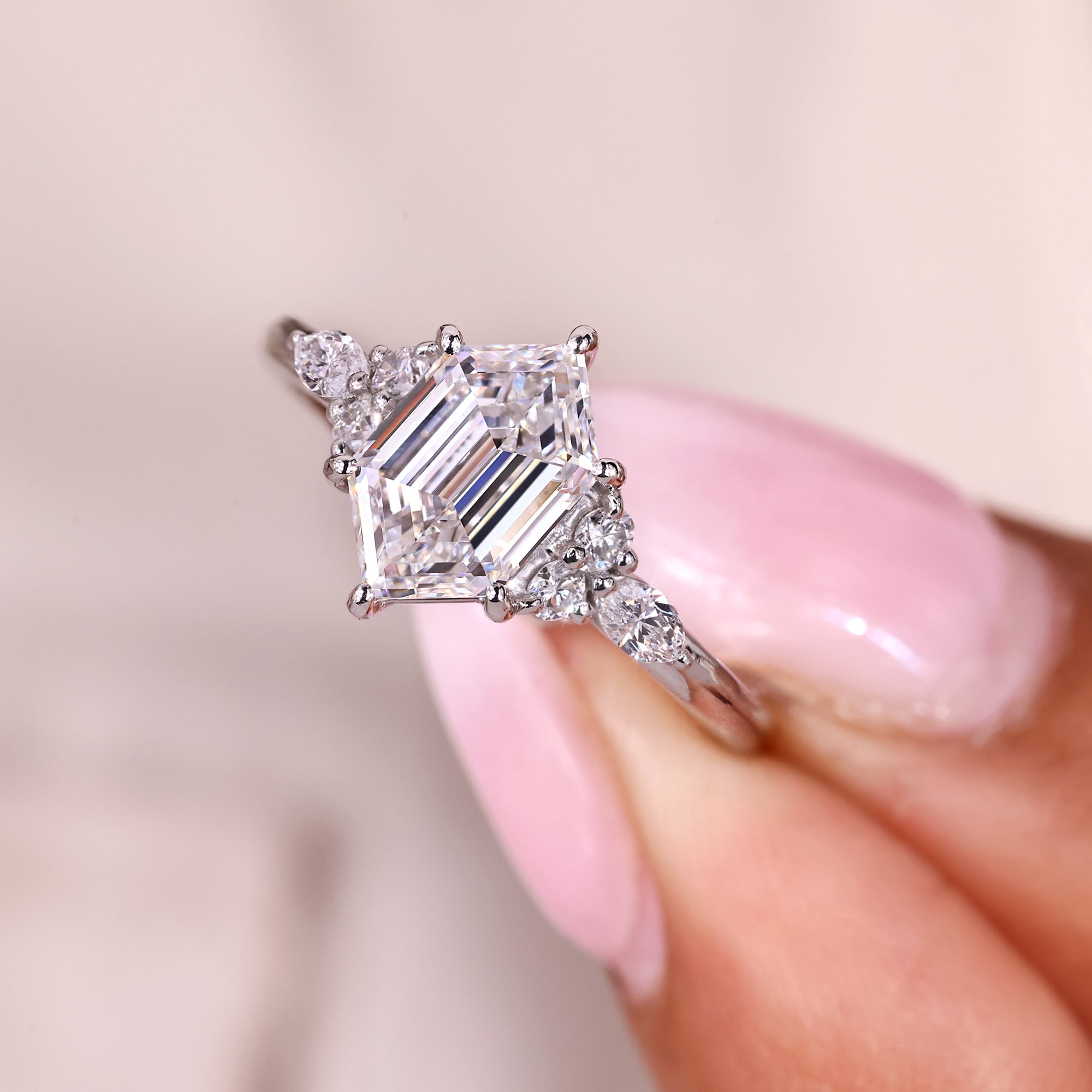 Seven stone ring with marquise and round side stones.