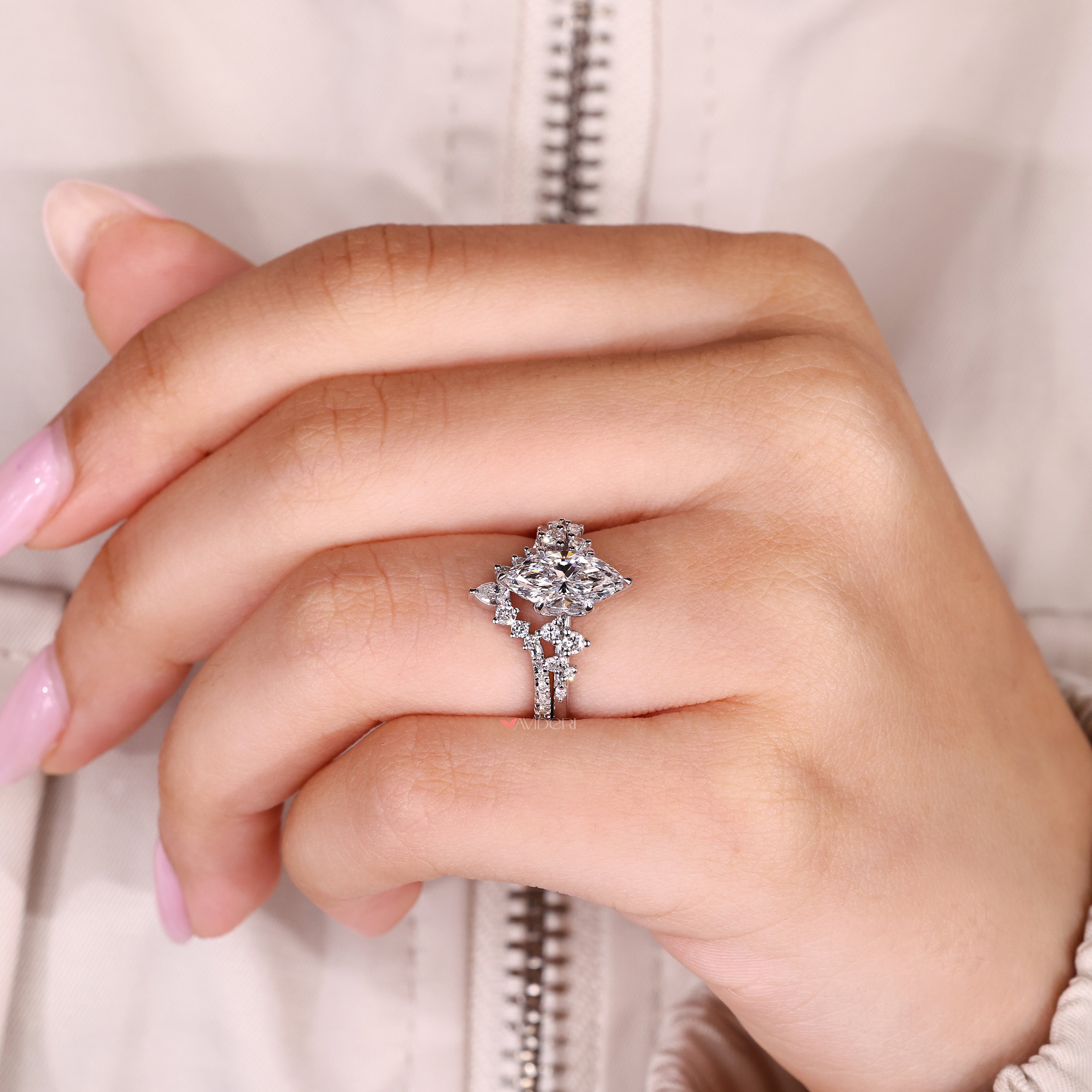 IGI certified marquise engagement ring with curved matching band
