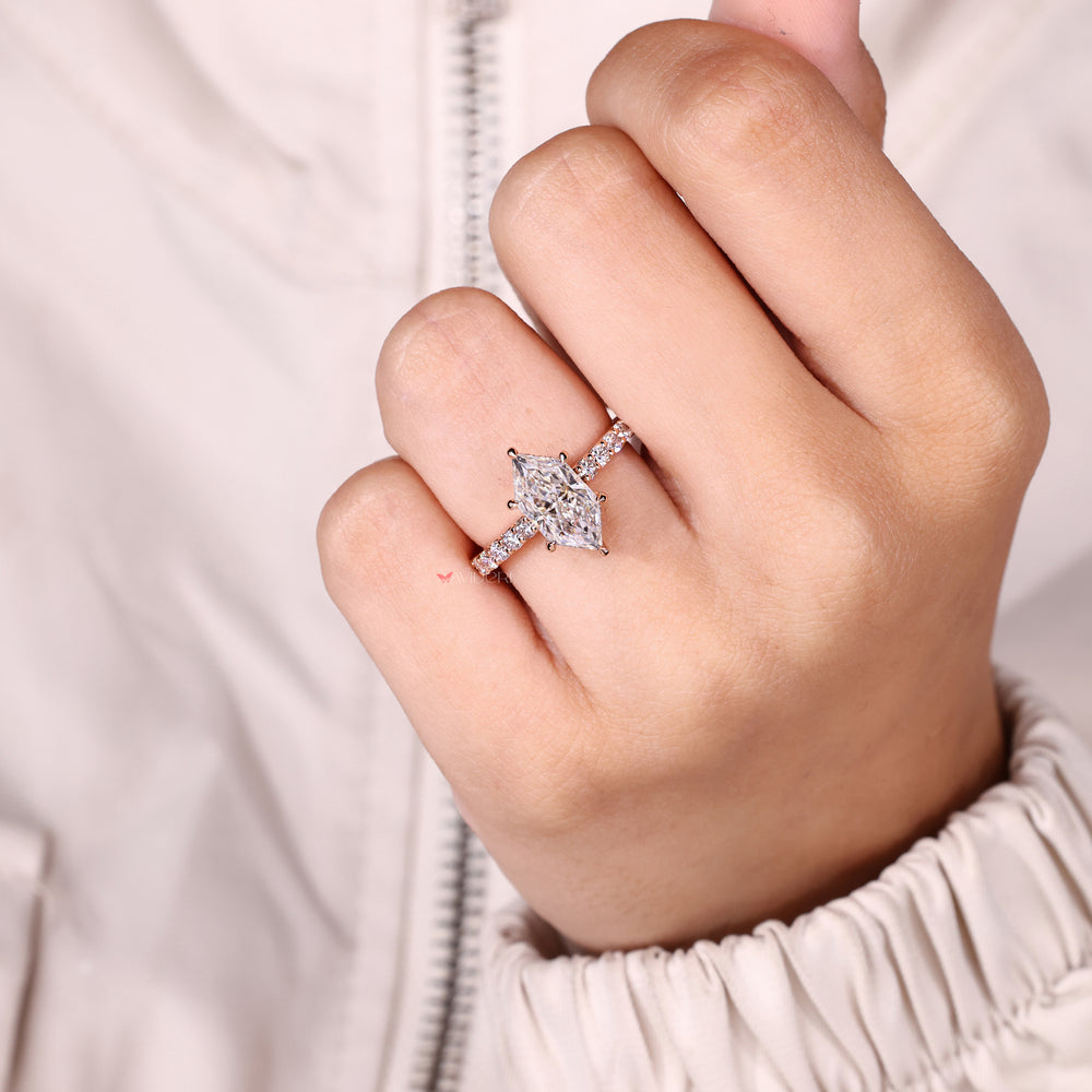 Hidden halo marquise ring with pave design.
