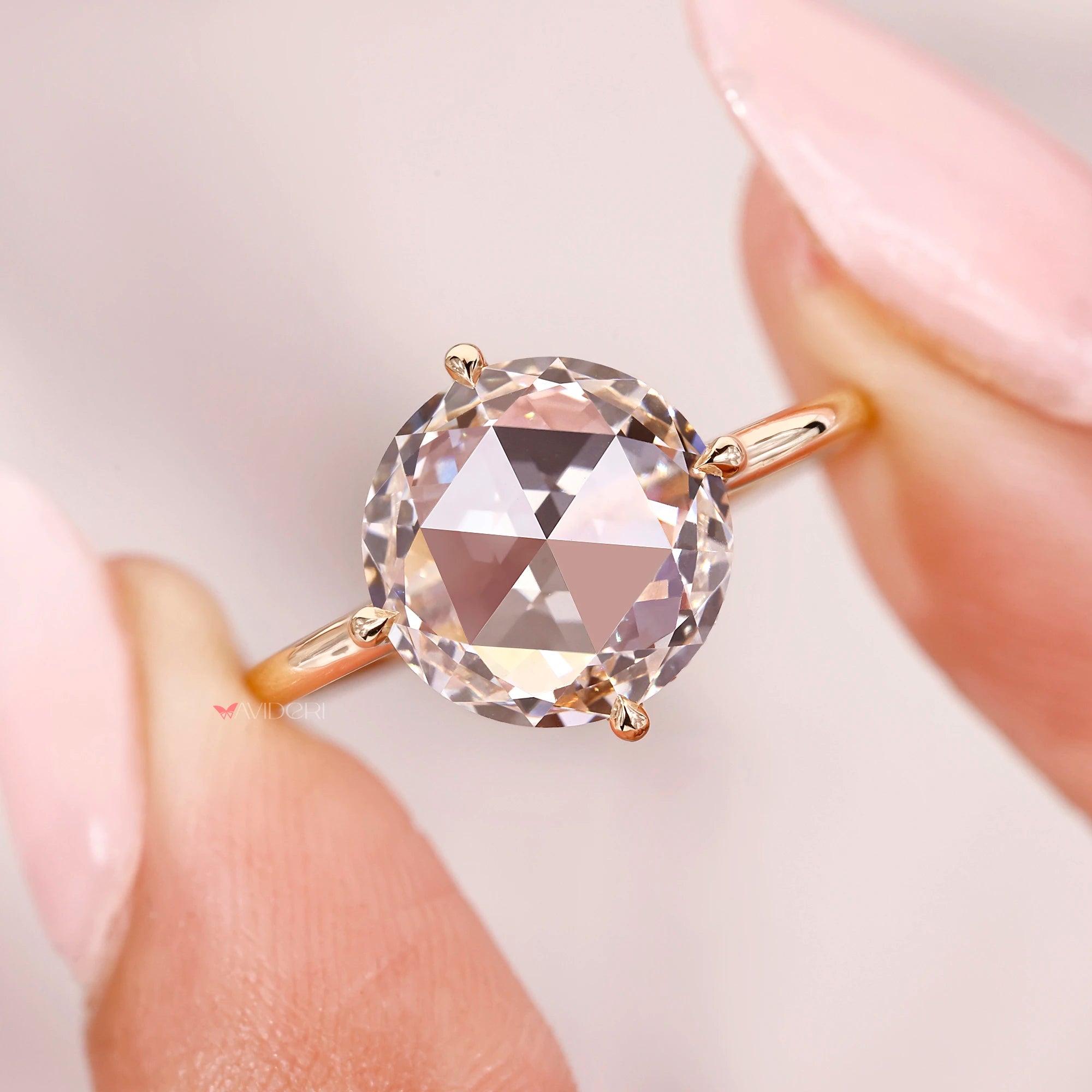 Compass prong setting with yellow gold engagement ring.