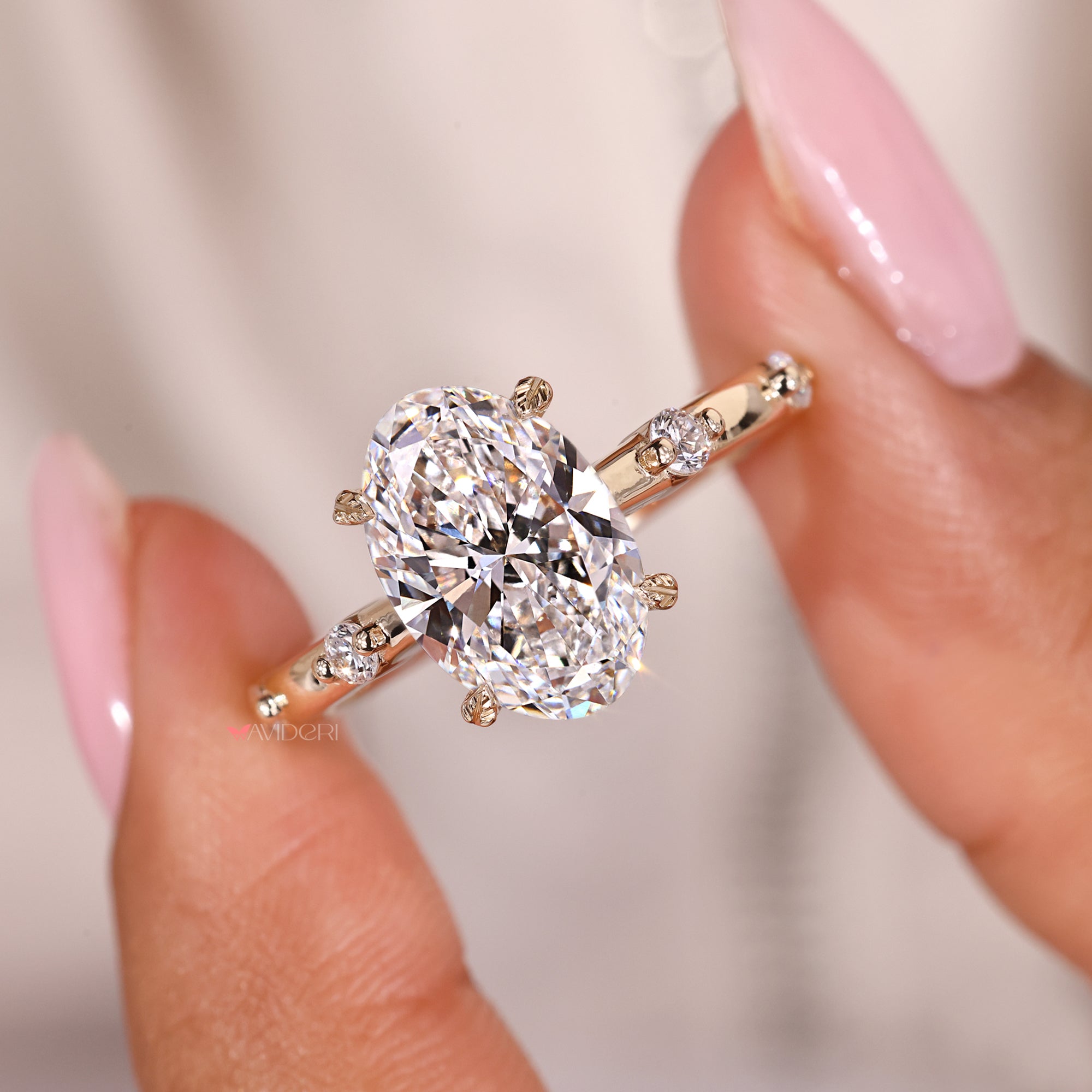 Leaf style prong setting holds diamonds like small leaves.