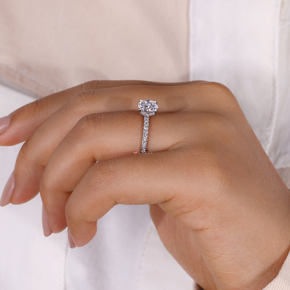 Pave ring diamond paired with a hidden halo design, perfect for timeless engagement moments.
