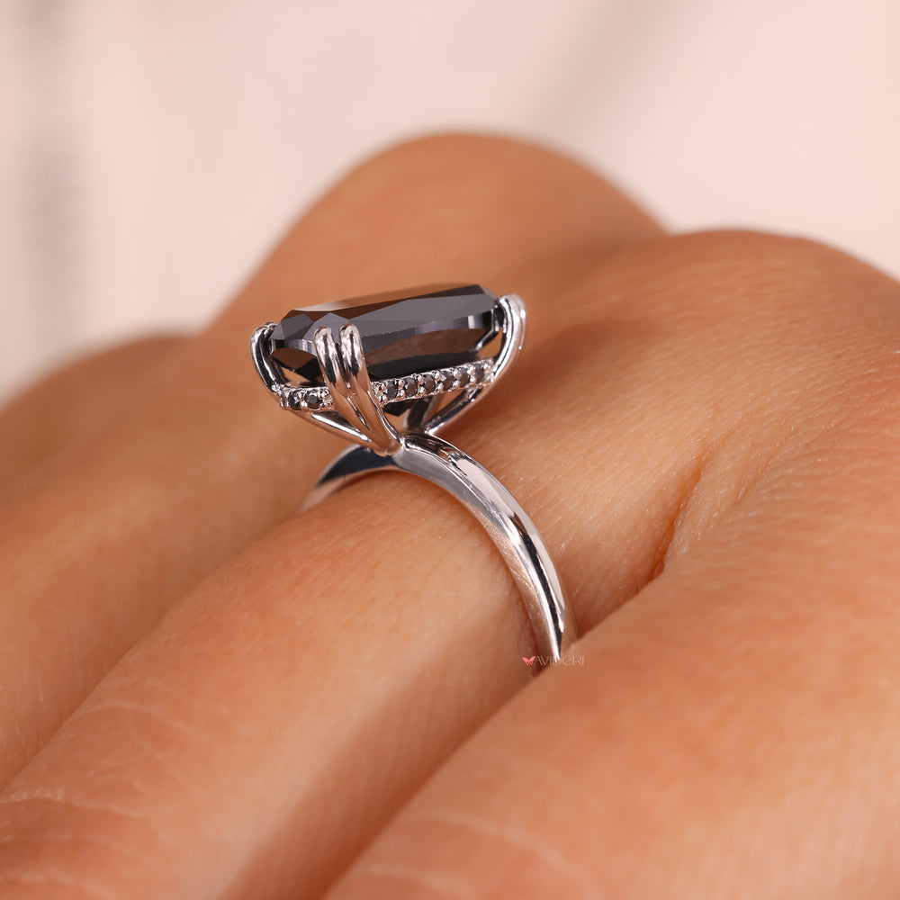 Round cut hidden halo setting sparkles beautifully under soft lighting.
