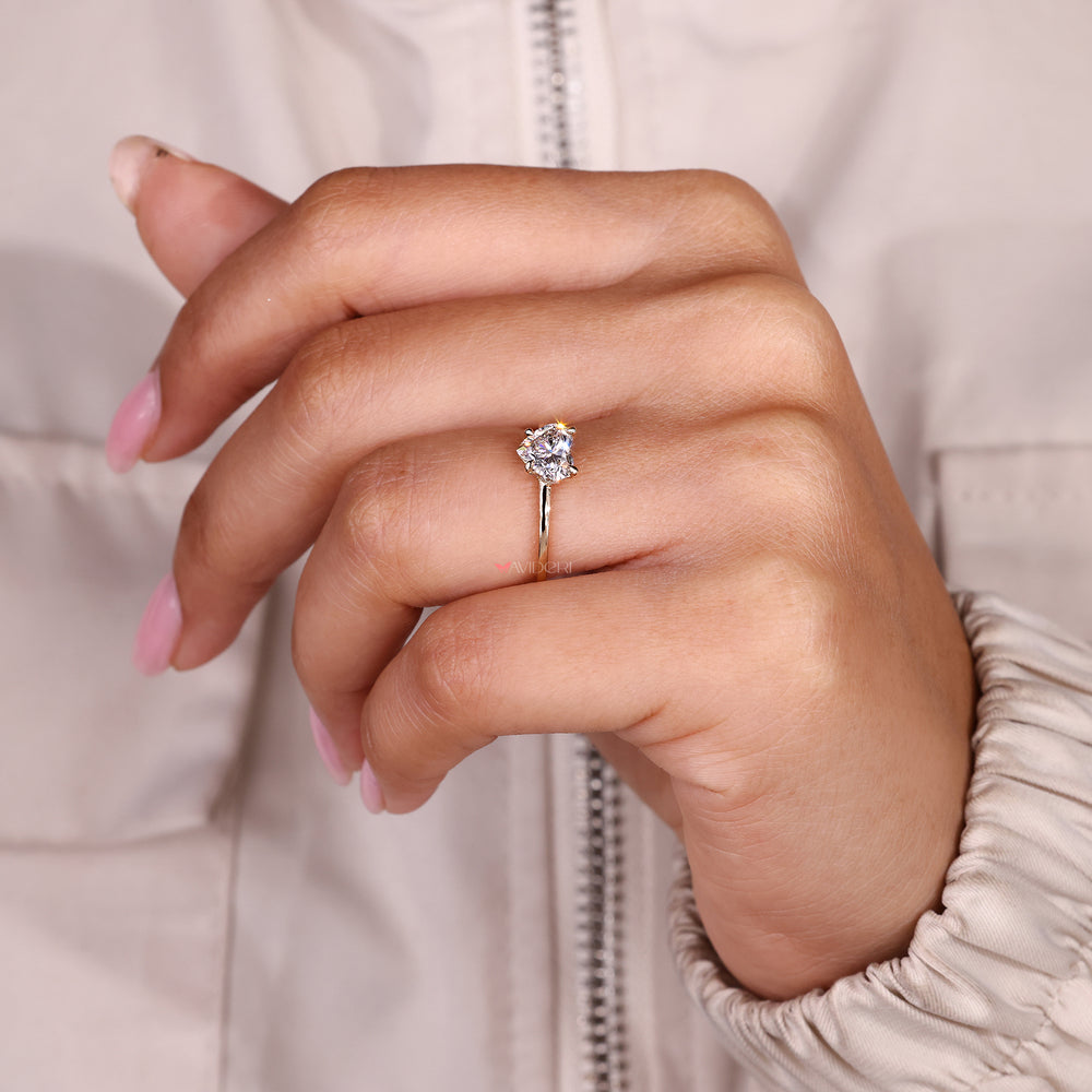 IGI certified heart cut diamond ring with elegant sparkle.
