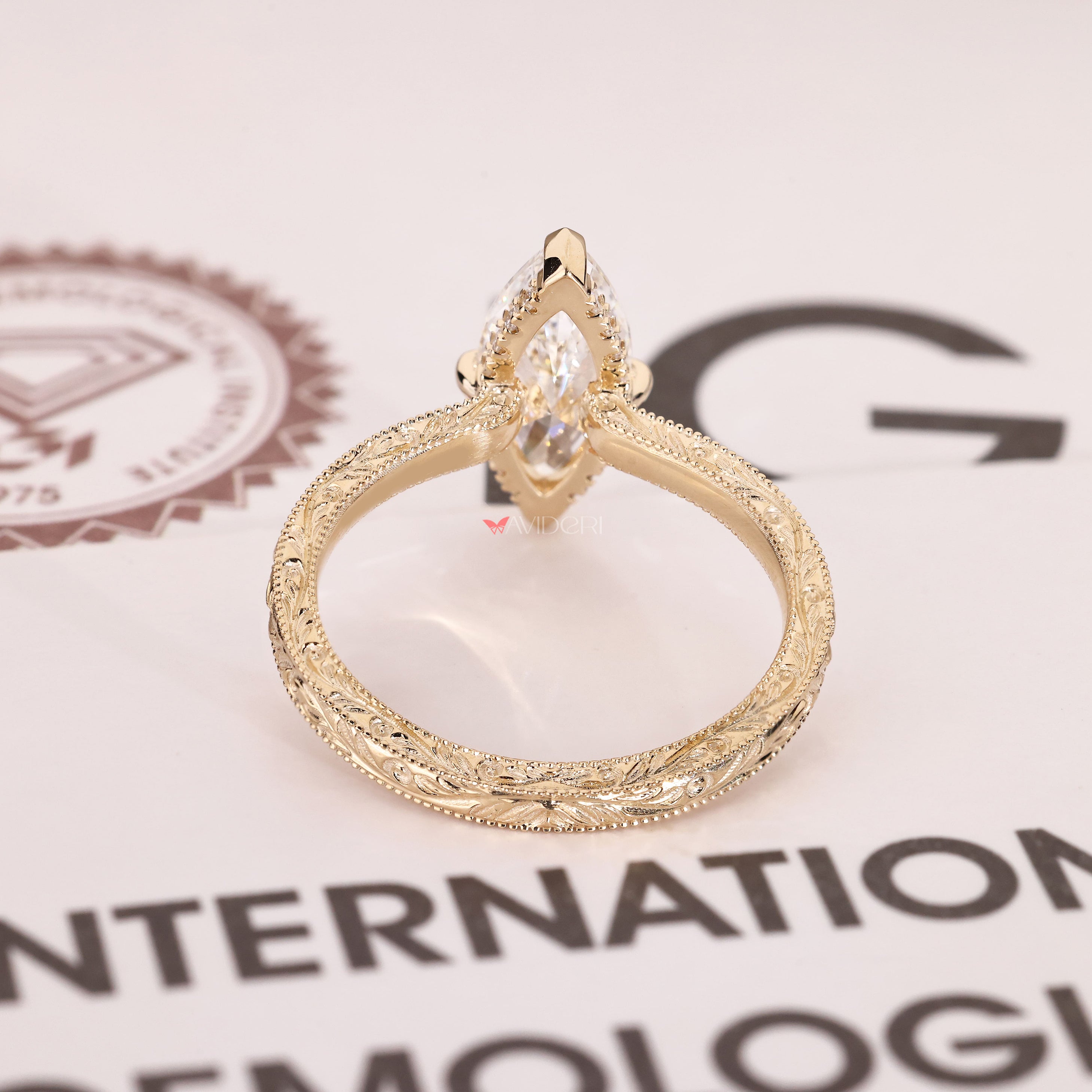 Milgrain marquise diamond ring with open gallery.
