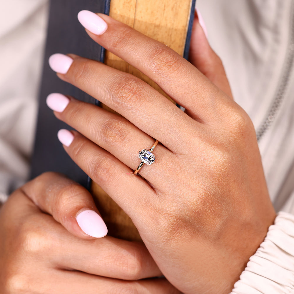 Open gallery cushion diamond ring with claw prong setting
