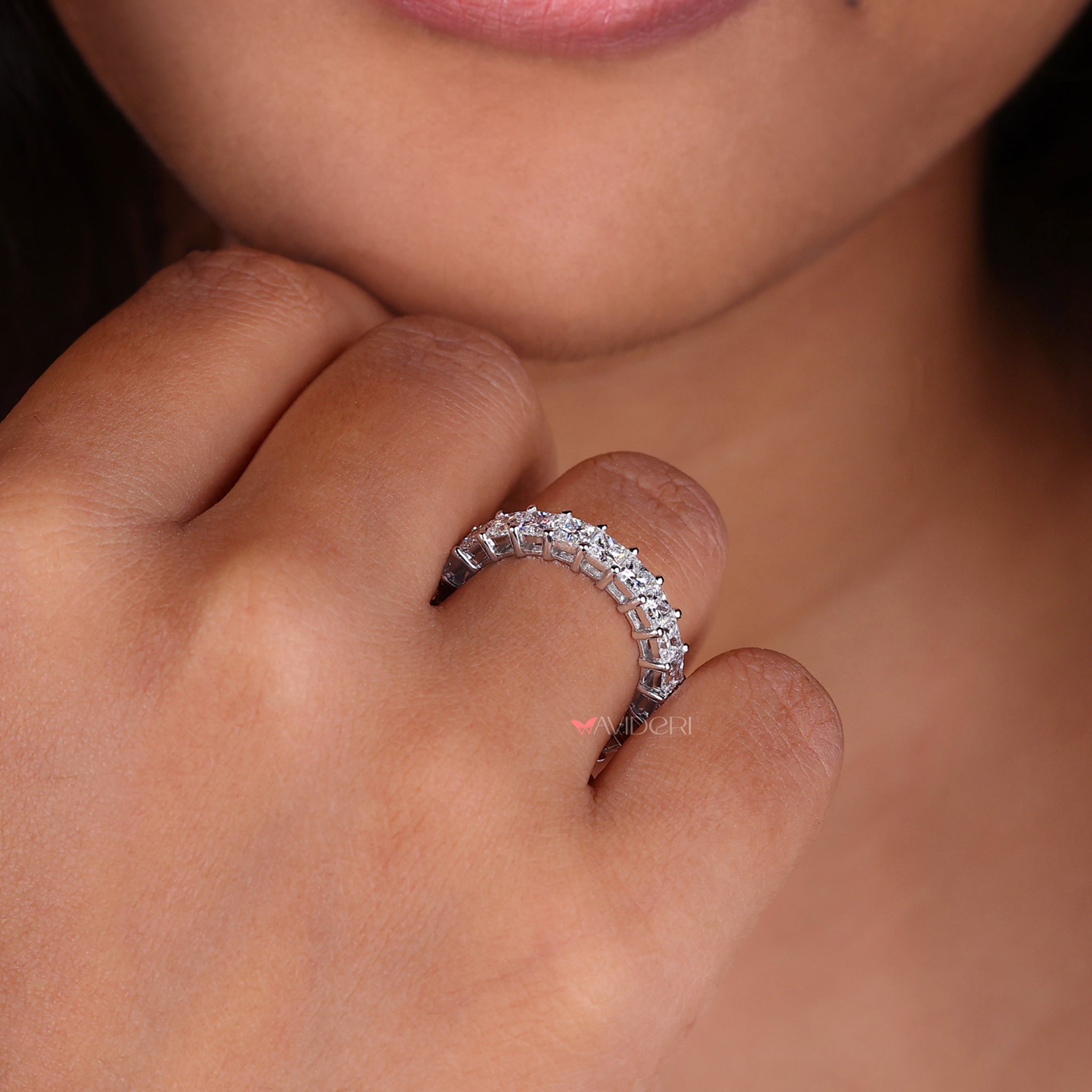 Princess cut eternity band in white gold.
