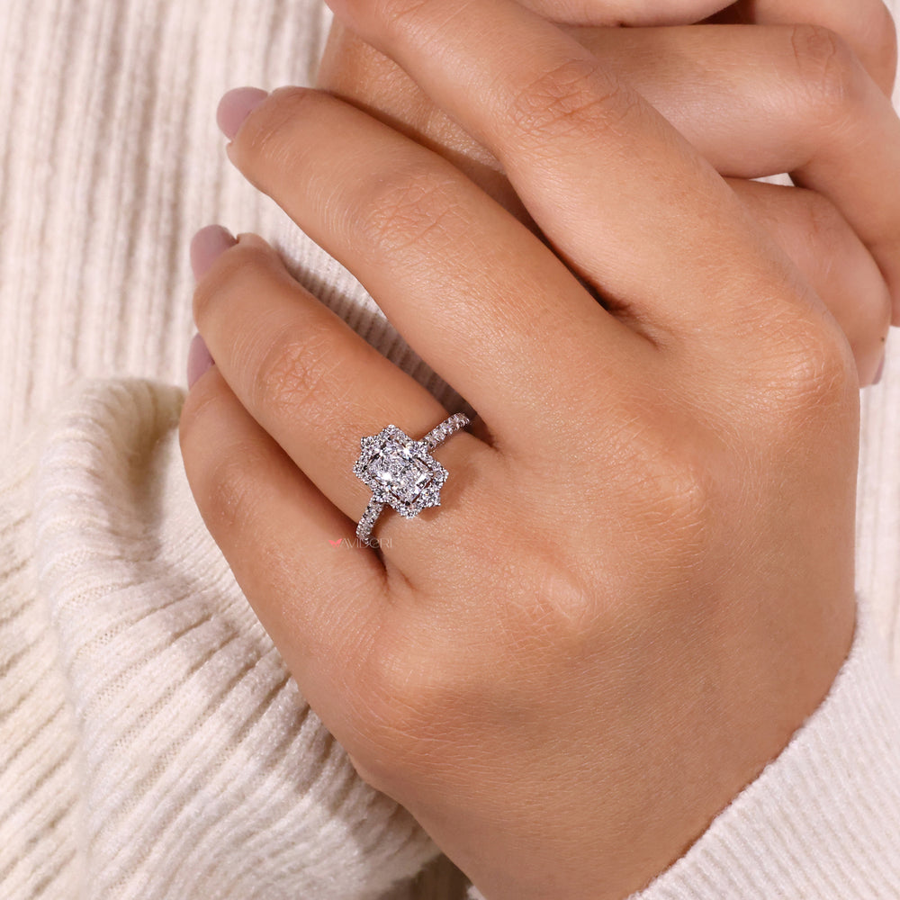 A pave diamond ring with a cathedral setting for modern sophistication.
