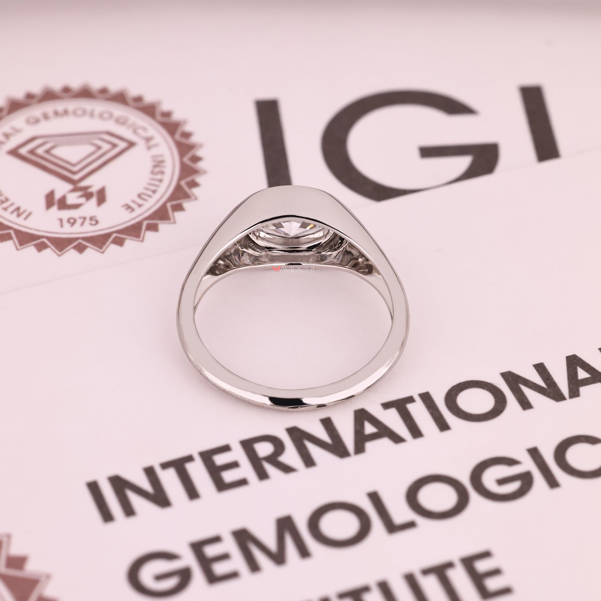 IGI certified oval cut diamond east to west ring.
