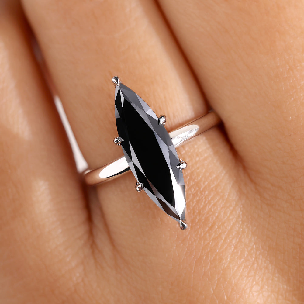 Marquise cut engagement ring set in white gold.