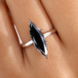 Marquise cut engagement ring set in white gold.
