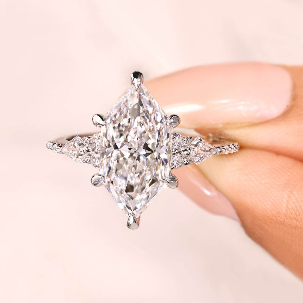 Lab grown diamond ring with tapered shank and side stones
