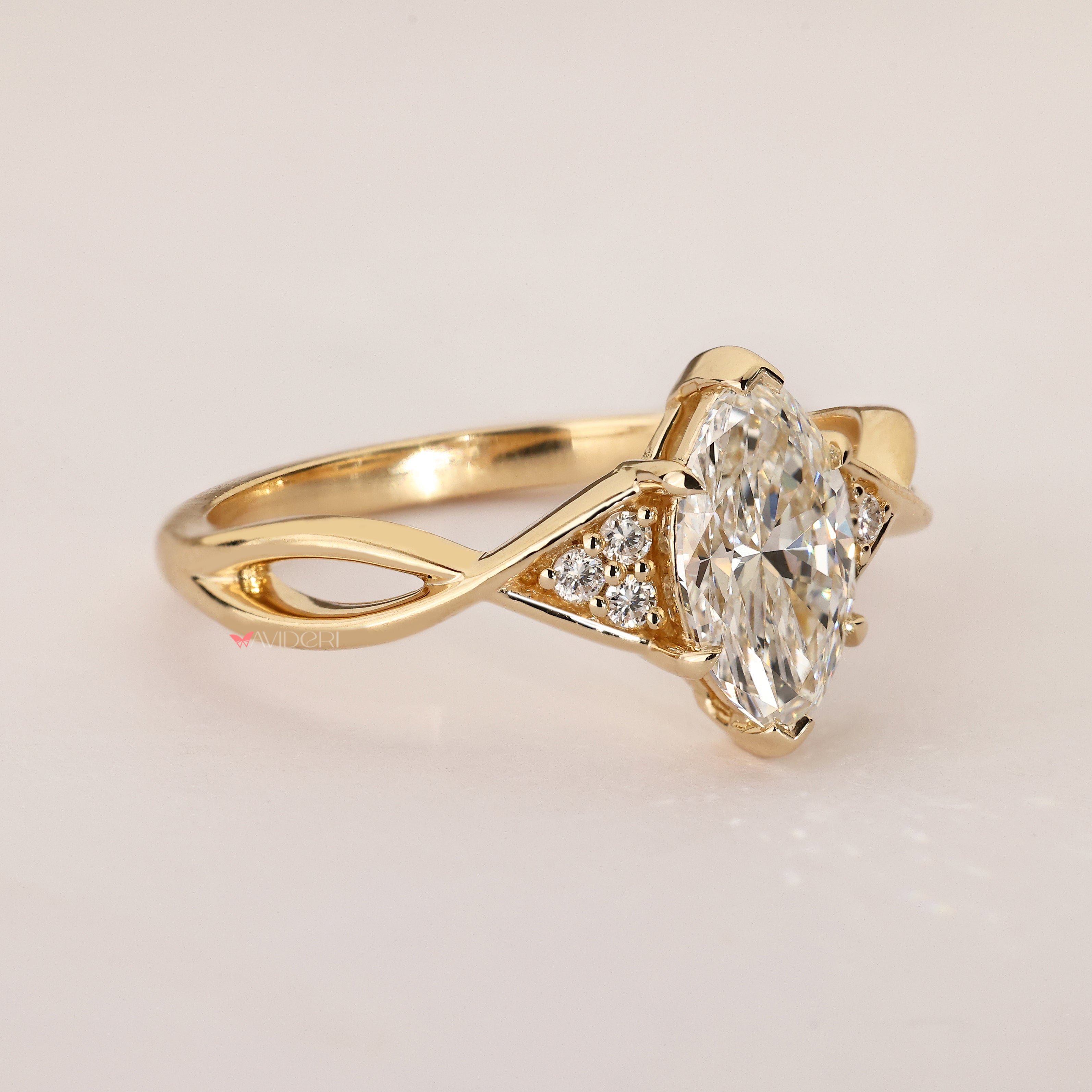 Marquise diamond ring with basket style setting.
