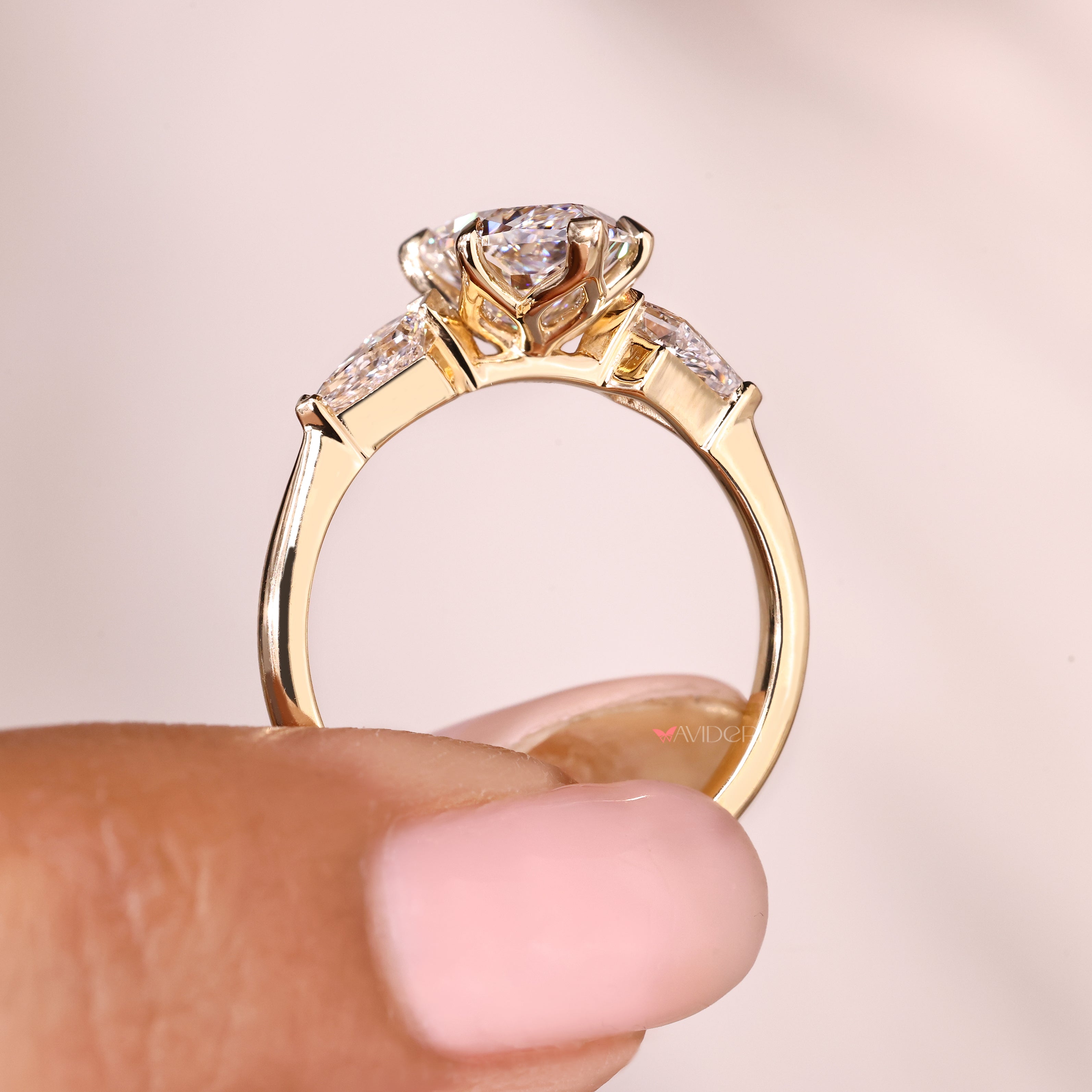 Dutch marquise engagement ring with V prongs and accents
