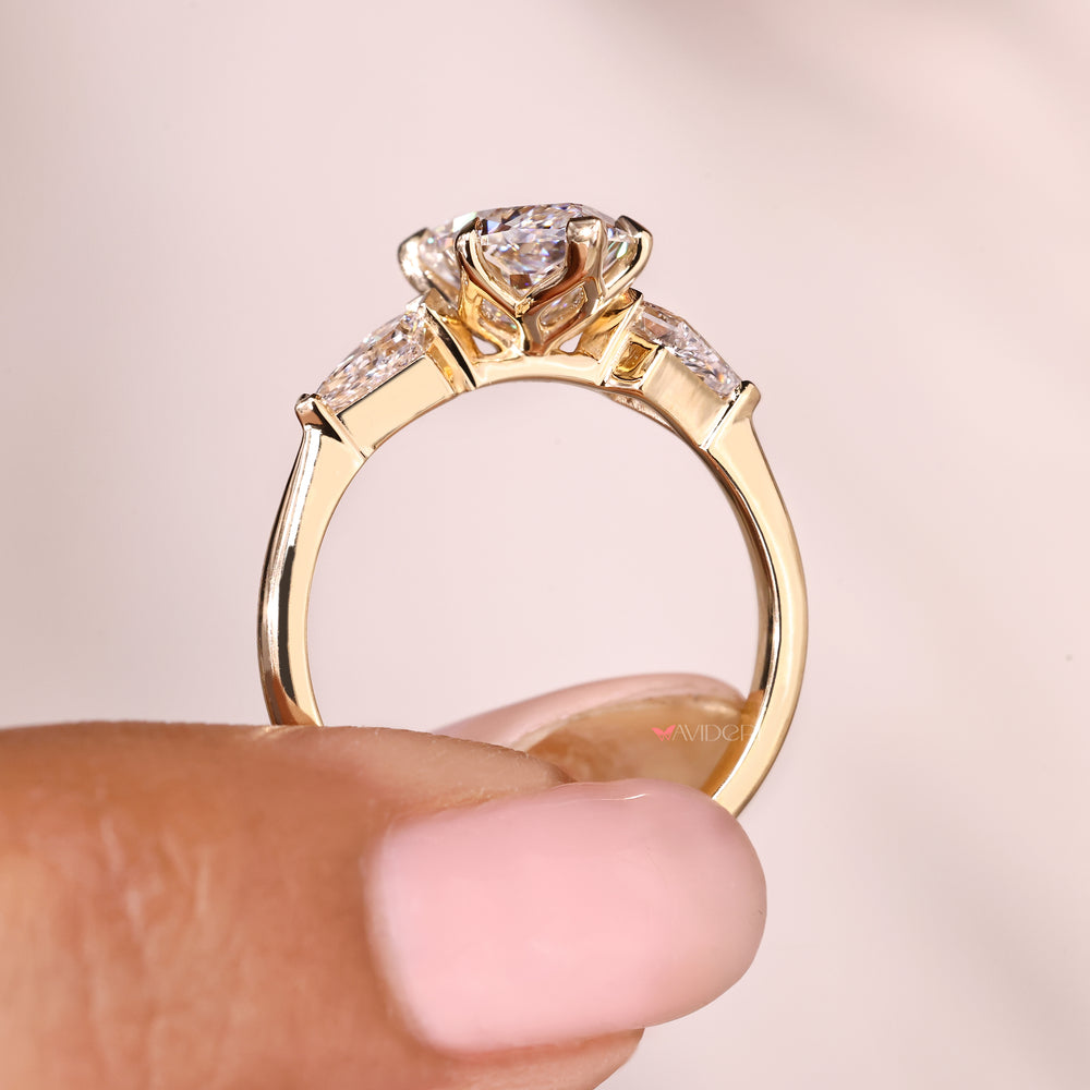 Dutch marquise engagement ring with V prongs and accents
